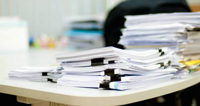 Conveyancing output surges 69% as workload increases paperwork business office applications