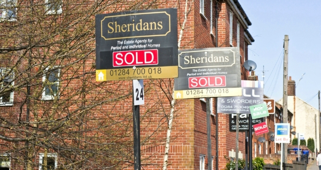 Market shows 'further signs of slowing' as house prices fall: Halifax For sale sold signs house