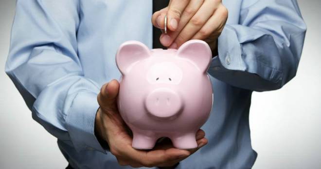 Standard Life drops drawdown charges Piggy Bank pink