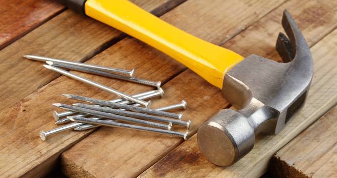 Soaring cost of building materials leaving homes underinsured hammer and nails new build
