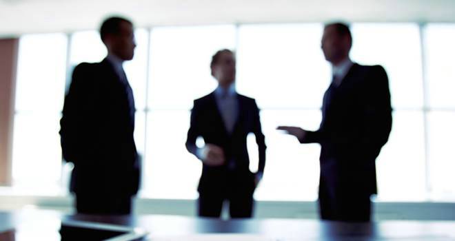 Providers 'must future-proof' pension products men in a meeting with graphs