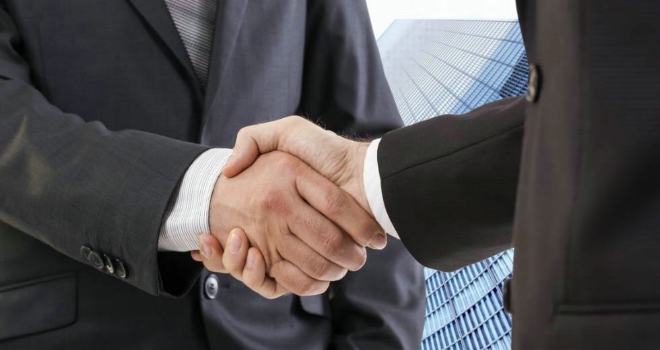The West Brom partners with My Home Move handshake business legal contract hire