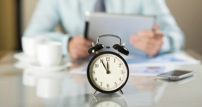 Consumer Duty report – The clock is ticking timing clock businessman