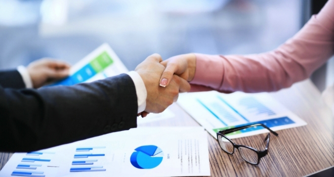 Saltus acquires Tavistock’s financial advice businesses business handshake