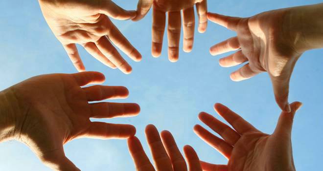 Hodge gives brokers 'helping hand' to grow later life business teamwork hands