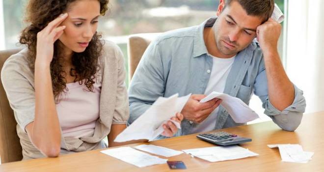 Debt consolidation soars as lending hits record levels couple debt worry forms