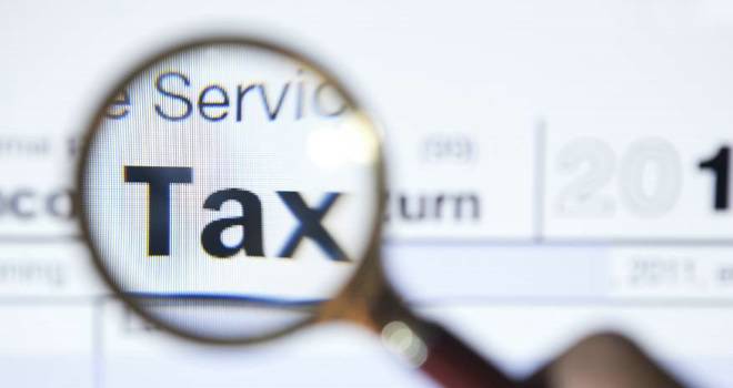 Chancellor abolishes 55% tax on pension funds at death tax magnifying glass