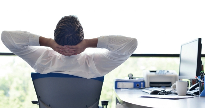 Majority of financial services employees enjoy working from home happy business man