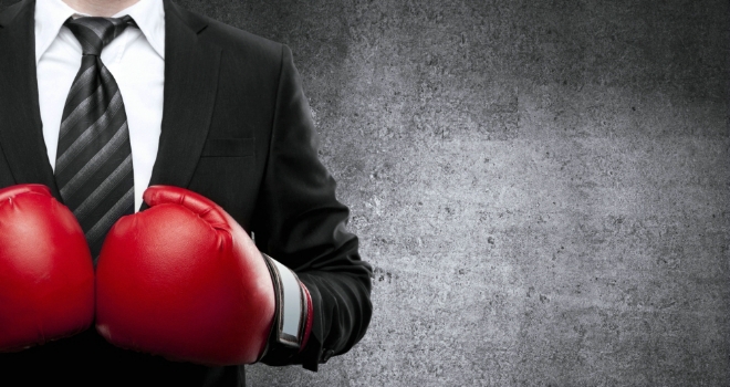 77% of advisers willing to adapt post-FAMR boxing business man