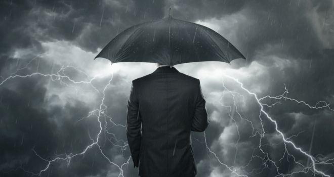 What are the biggest issues for brokers and their clients in H2? businessman adviser umbrella warn storm