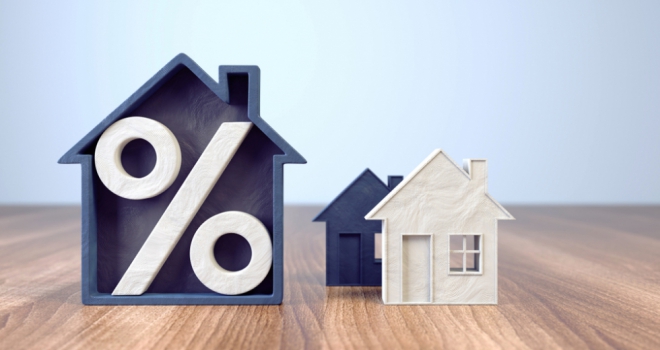 OBR predicts 10% fall in house prices house with percentage sign