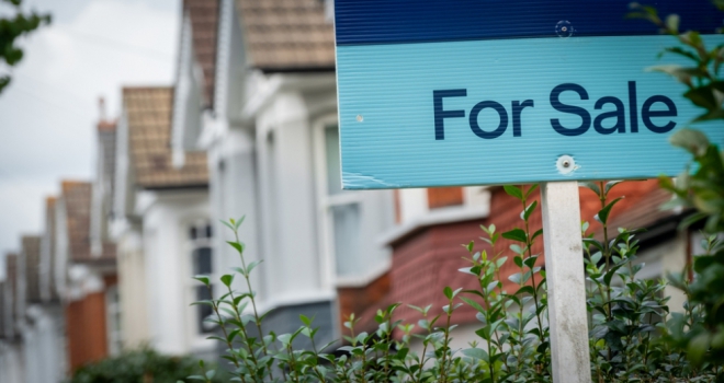 House prices fall amid Budget speculation: Halifax house price sign sale
