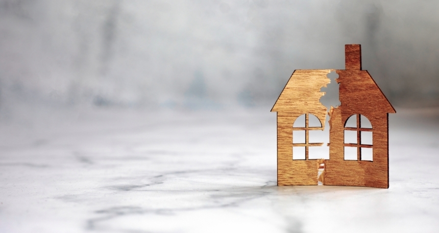 New report reveals how domestic abusers are weaponising joint mortgages against 750,000 UK women A broken house. Divorce and division of property.