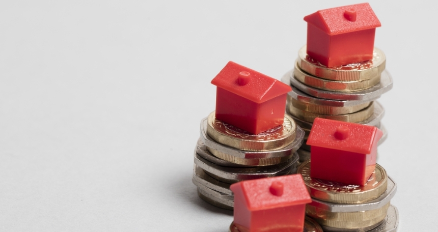 Housing affordability returned to pre-pandemic levels in 2024: ONS house price coin money up down