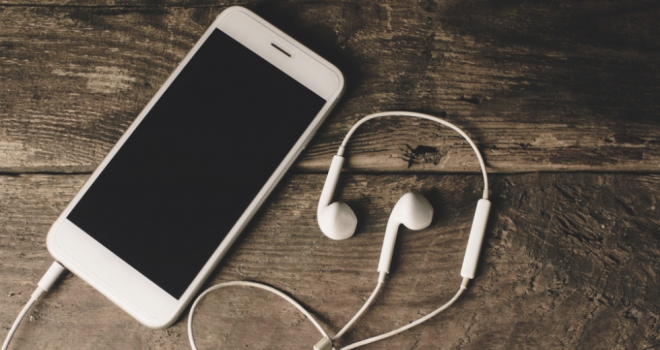EXCLUSIVE: Quilter Financial Planning launches podcast series phone headphones listen podcast