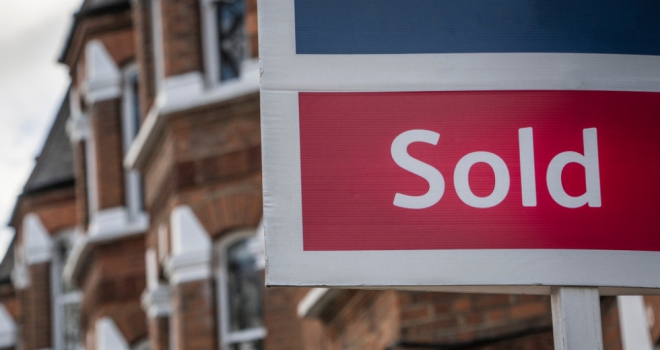 House price growth accelerates to 12.4%: UK HPI Sold house sign