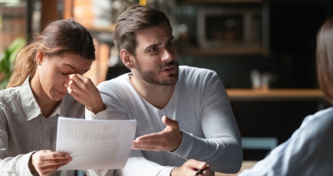 What's causing the prevalence of gazumping and can it be stopped? stress fraud home buyer couple gazumping