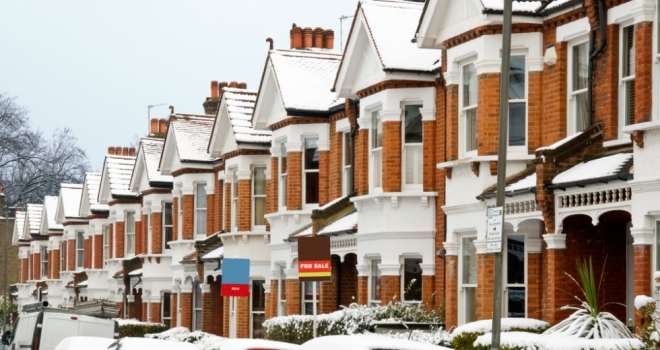 Housing market in a winter house snow cold
