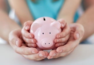 Bank of Mum and Dad flips as over half of adult children set to financially support parents Mum family child save saving pig pension money
