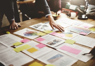 SME optimism tempered by funding issues  business paperwork smes sme small meeting adviser legal deal