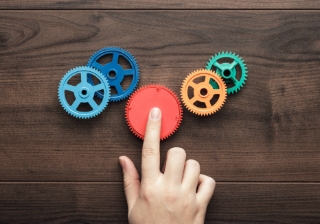 ENABLE Guarantee supports invoice finance lending for the first time coloured gears changing add combine join partnership