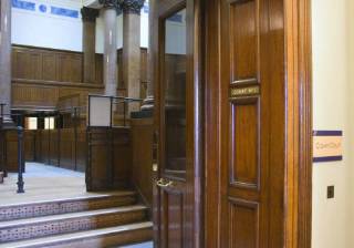 Director sentenced to two years in prison for £1m investment fraud court courtroom jail judge fined ban