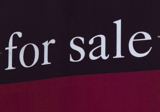 for sale sign white houses