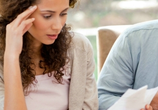 Economic climate affecting 83% of mortgage holders couple debt worry forms