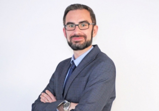 The Tipton enhances residential expat mortgage range andy millard from tipton bs, wearing a suit, in front of plain background