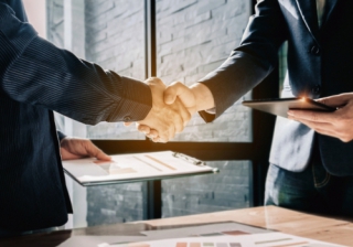 HLPartnership secures investment from South African mortgage distributor deal agreement business hand handshake acquire