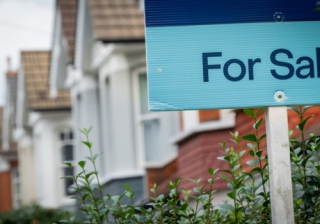 House prices fall amid Budget speculation: Halifax house price sign sale