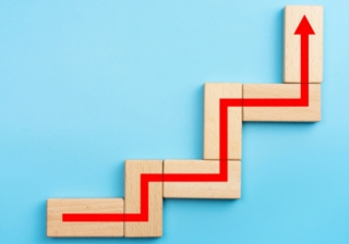 West One enhances residential and second charge criteria journey arrows up