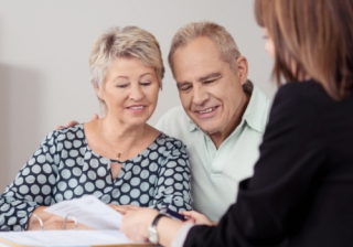 Financial advice is the top reason people opt for an annuity old oap retire retirement later life couple equity release adviser advice intermediary