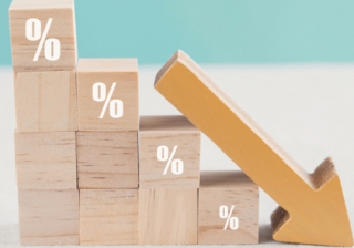 Ultimate Finance reduces bridging rates blocks with percentage signs going down