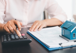 homeowner paying money