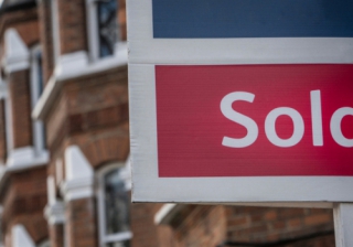 Summer housing market remains resilient with uplift in transactions: HMRC Sold house sign