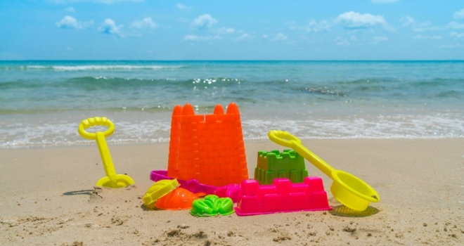 Top tips to keep your home protected while you're on holiday bucket and spade