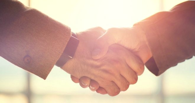 Case study: Atom bank completes £1m funding for commercial project in Edinburgh handshake 77