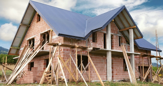 Barratt reveals 12 year high for home completions house construction