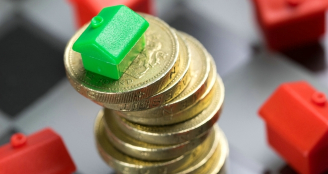 House price growth at 5.6% says Land Registry coin stack