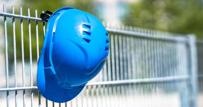 How to avoid falling prey to cowboy builders builders hat on fence