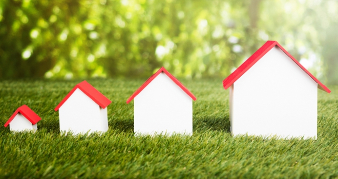 Foundation Home Loans announces new remortgage-only buy-to-let products series of model houses of different sizes on grass