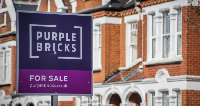 Purplebricks shareholders split dramatic vote on chair purplebricks estate agency sign outside house