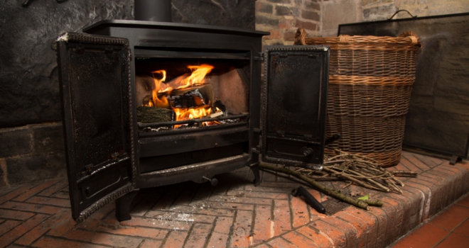 One in ten plan to ditch central heating for real fires this autumn Wood burning stove 744